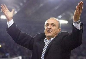 Lazio's coach Rossi celebrates during the Serie A soccer match against AS Roma in Rome